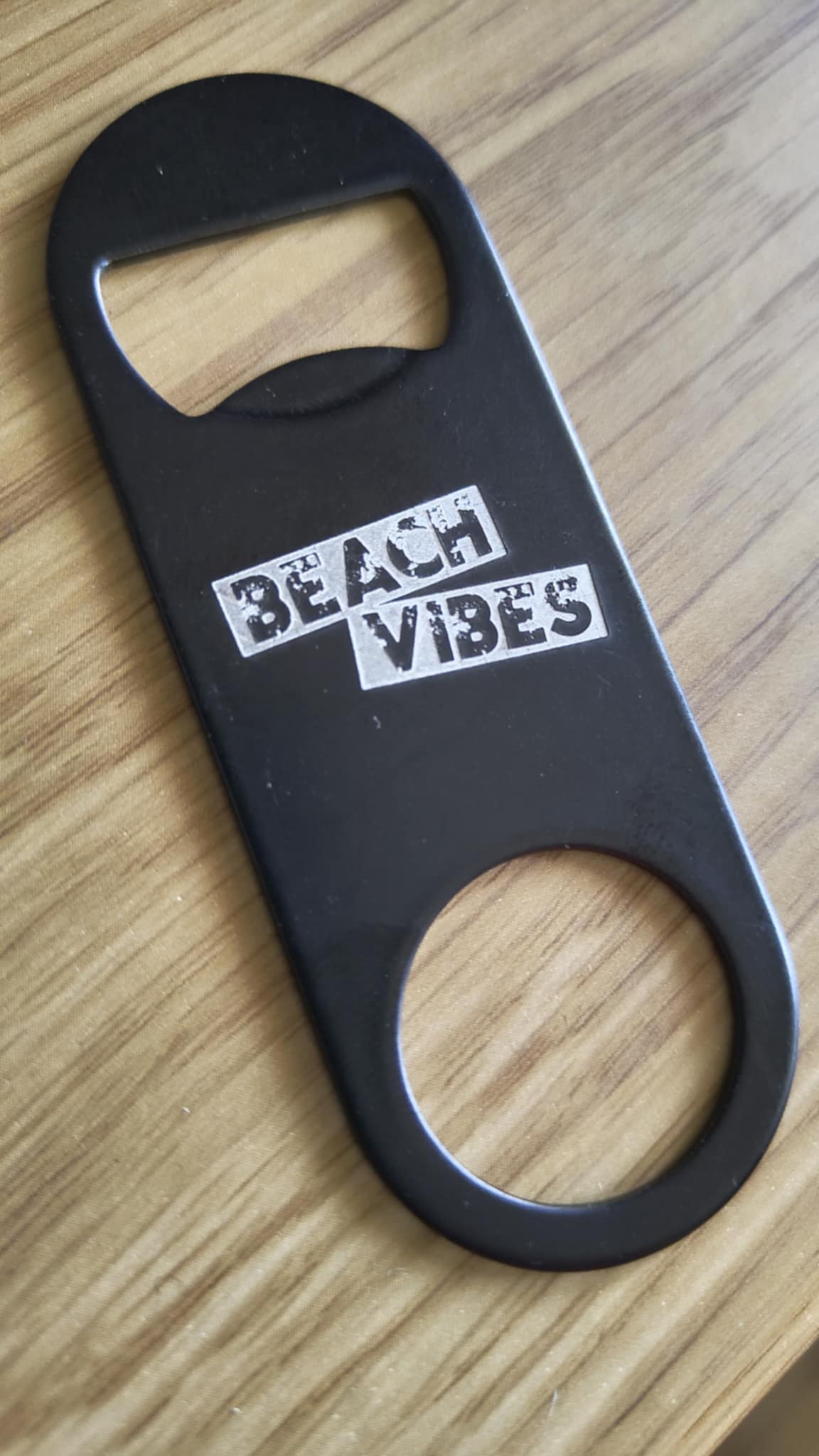 Etched bottle opener